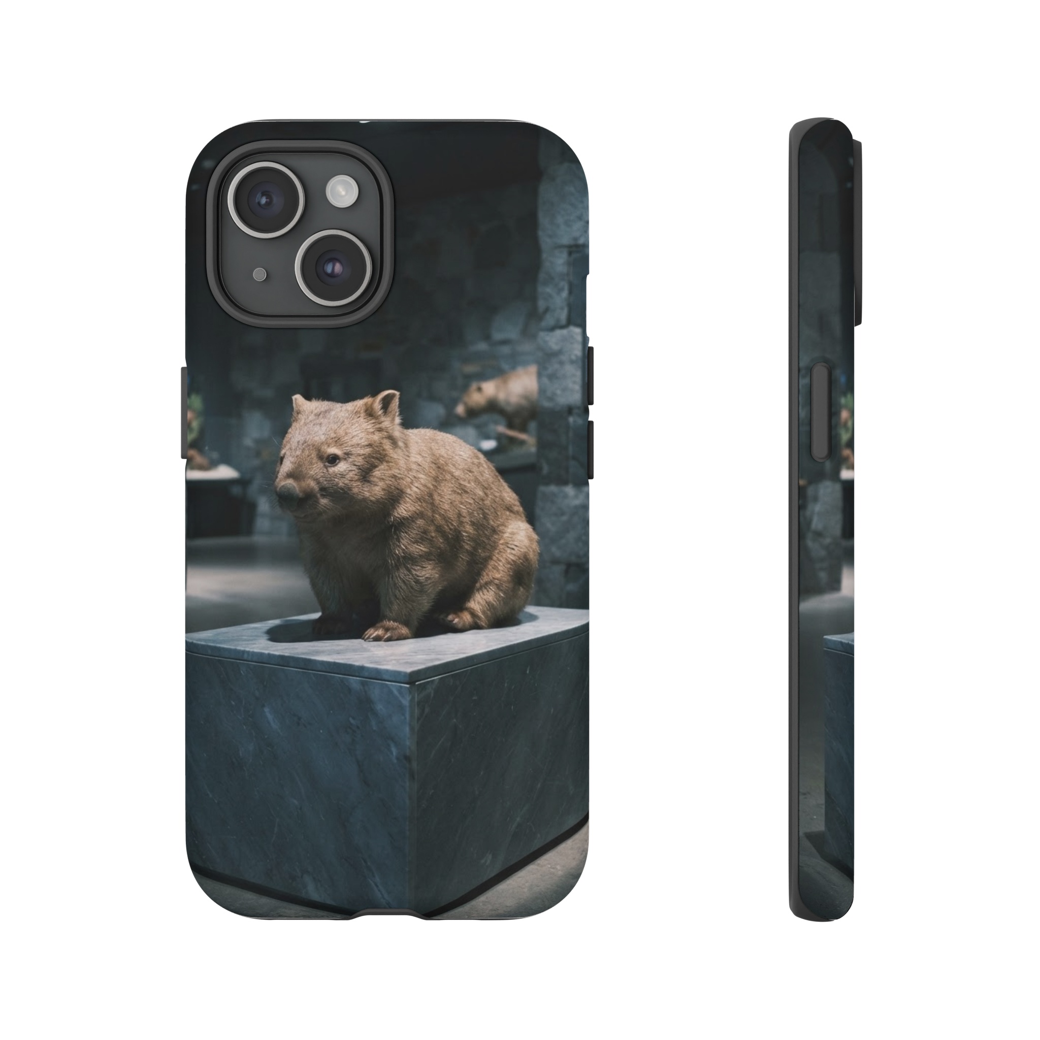 A lone wombat sits on a polished marble pedestal in a dimly lit gallery, its earthy brown fur contrasting with the cool, bluish-gray tones of the surrounding stone walls and soft spotlights that cast gentle shadows around its rounded form.