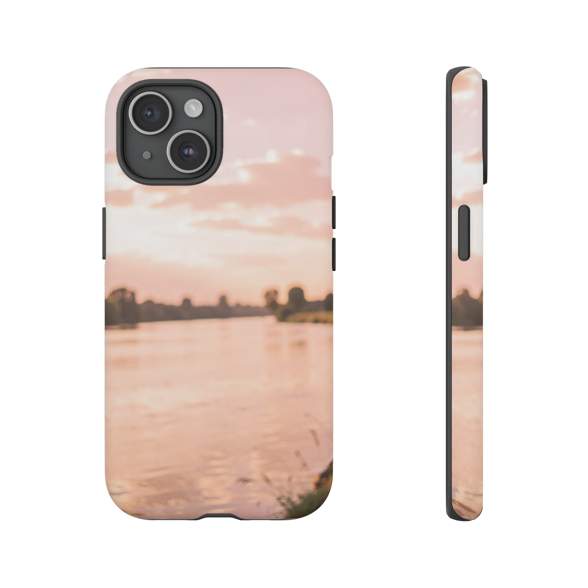 A breezy riverbank scene where soft pastel clouds blur into a hazy pink‑orange sky, with dappled light reflecting off gentle water and vague silhouettes of distant trees.