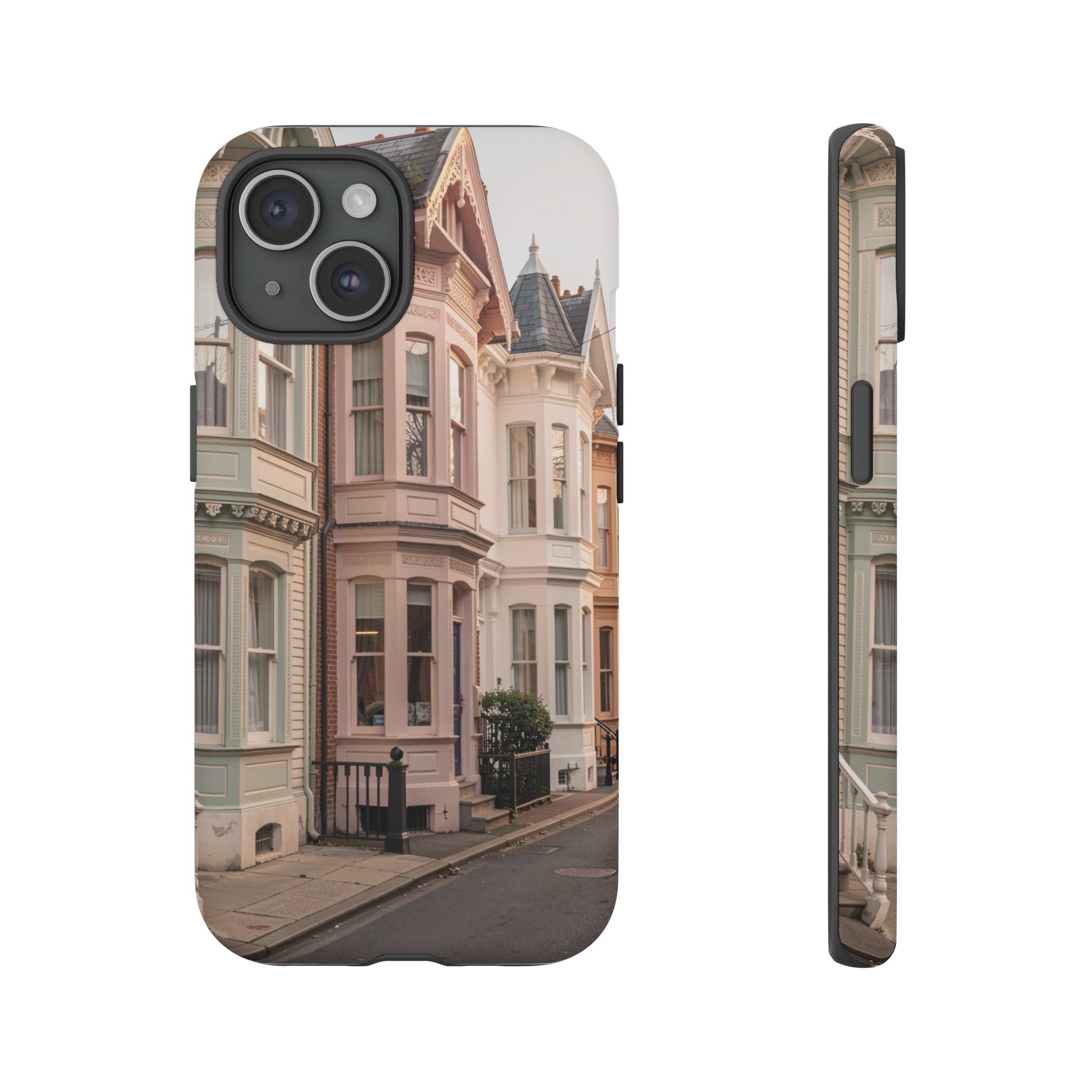 A narrow street lined with three ornate Victorian houses, their gingerbread trim and tall, narrow windows painted in muted pastel hues, glinting under soft late‑afternoon light.